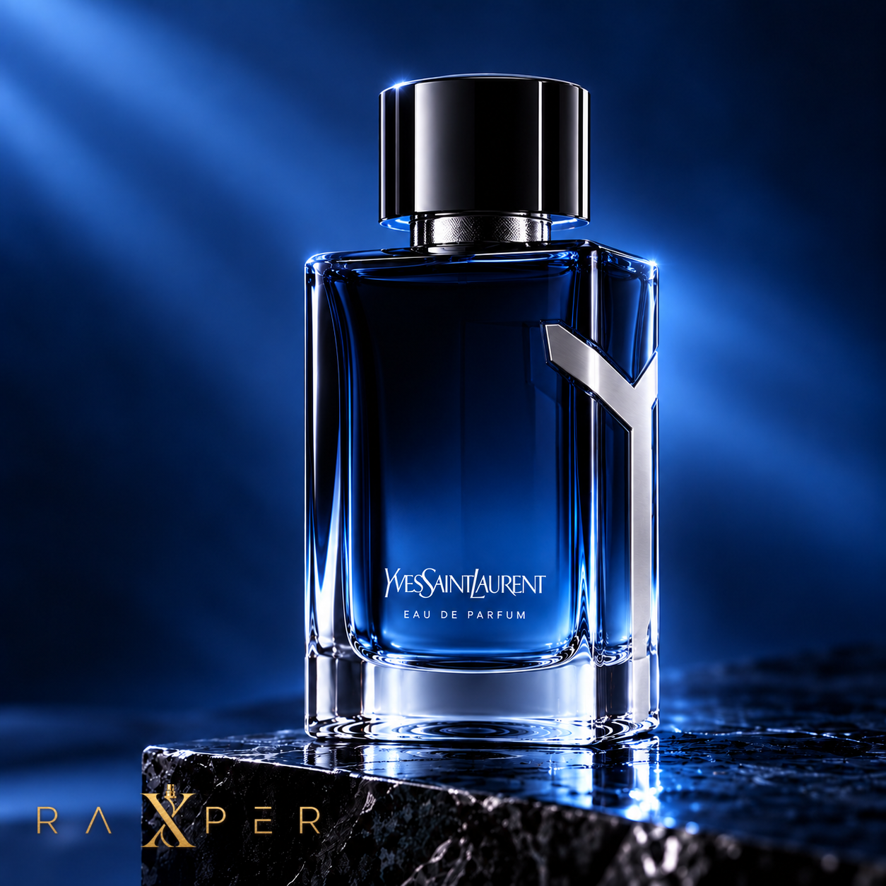 عطر ایو سن لورن وای ادو پرفیوم با شیشه آبی تیره و نشان فلزی Y در نمای استودیویی لوکس